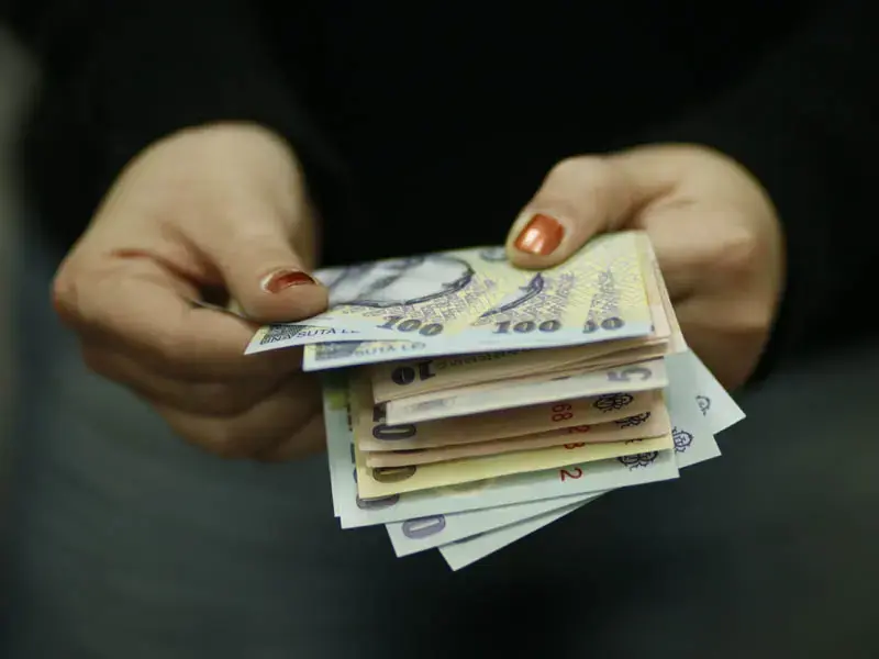 Modificări importante în Legea salarizării 2026: Valoarea de referință a scăzut după discuții la Cotroceni